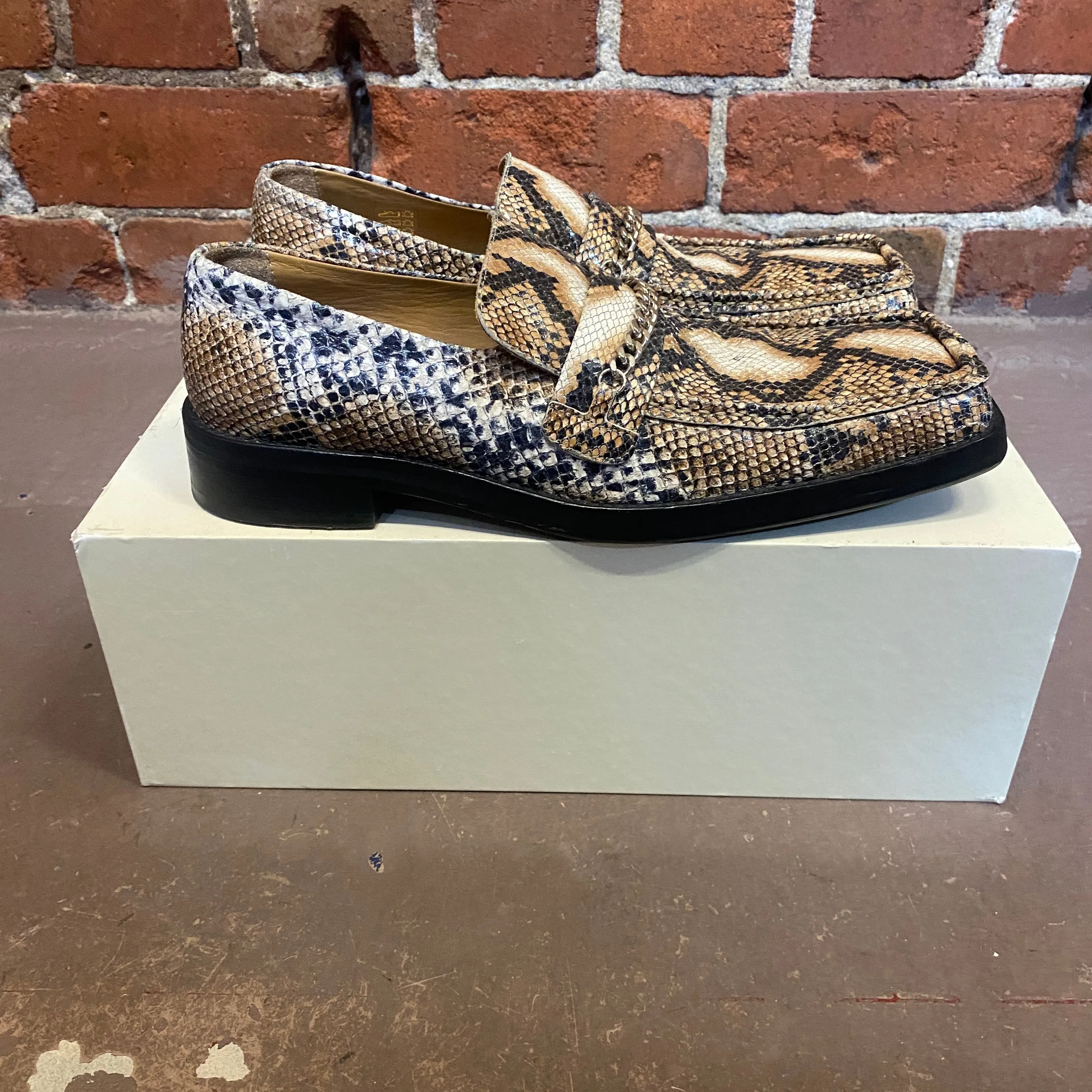 MARTINE ROSE snake print loafers